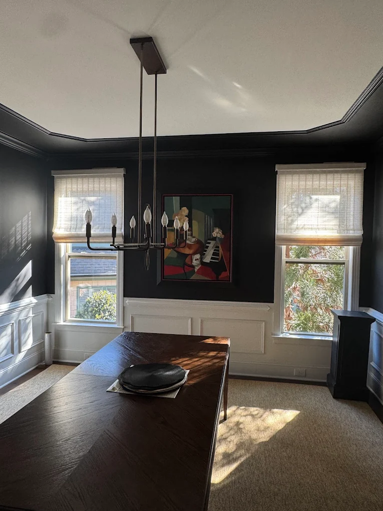 Living room with curtains and shades