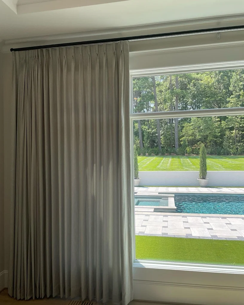 Cream drapery and sliding door