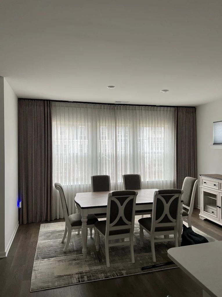 Gray drapery overlooking pool